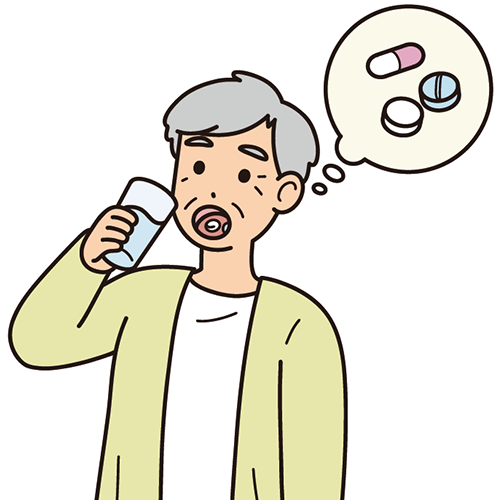 薬を飲む男性
