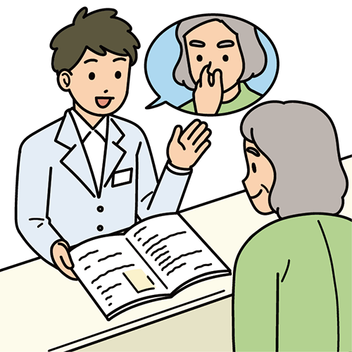 患者さんに出血について説明する薬剤師